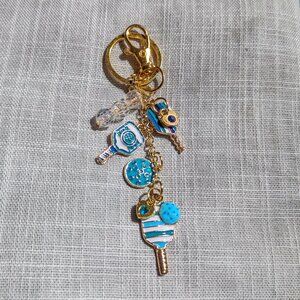 PICKLE BALL KEYCHAIN BLUE & GOLD BAG CHARM